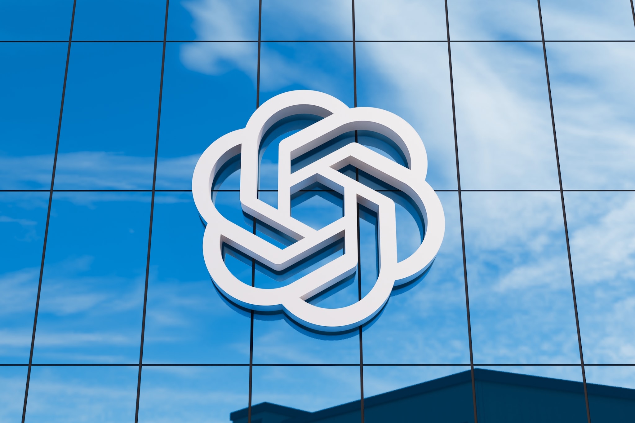 Het logo van OpenAI op het hoodfkantoor in India. Foto: Prathmesh T/Shutterstock Shutterstock