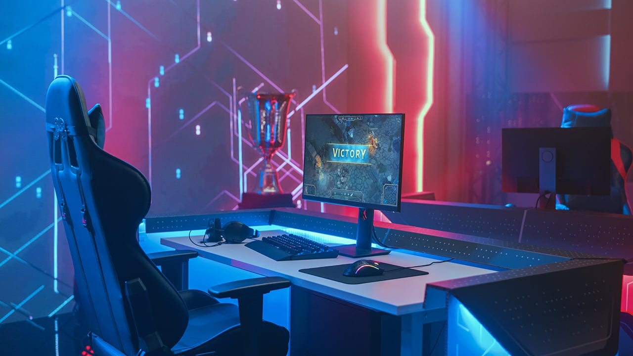 Game setup met het woord ‘victory’: een bekende term die wordt gebruikt bij winst in games.  Game-setup met het woord ‘victory’ op de monitor: een bekende term die wordt gebruikt bij winst in games. Foto: Money.it.