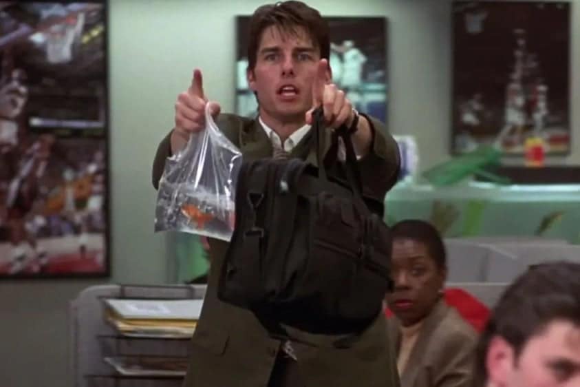 Tom Cruise in de film Jerry Maguire (1996). Tom Cruise in de film Jerry Maguire (1996). Foto: Getty Images.